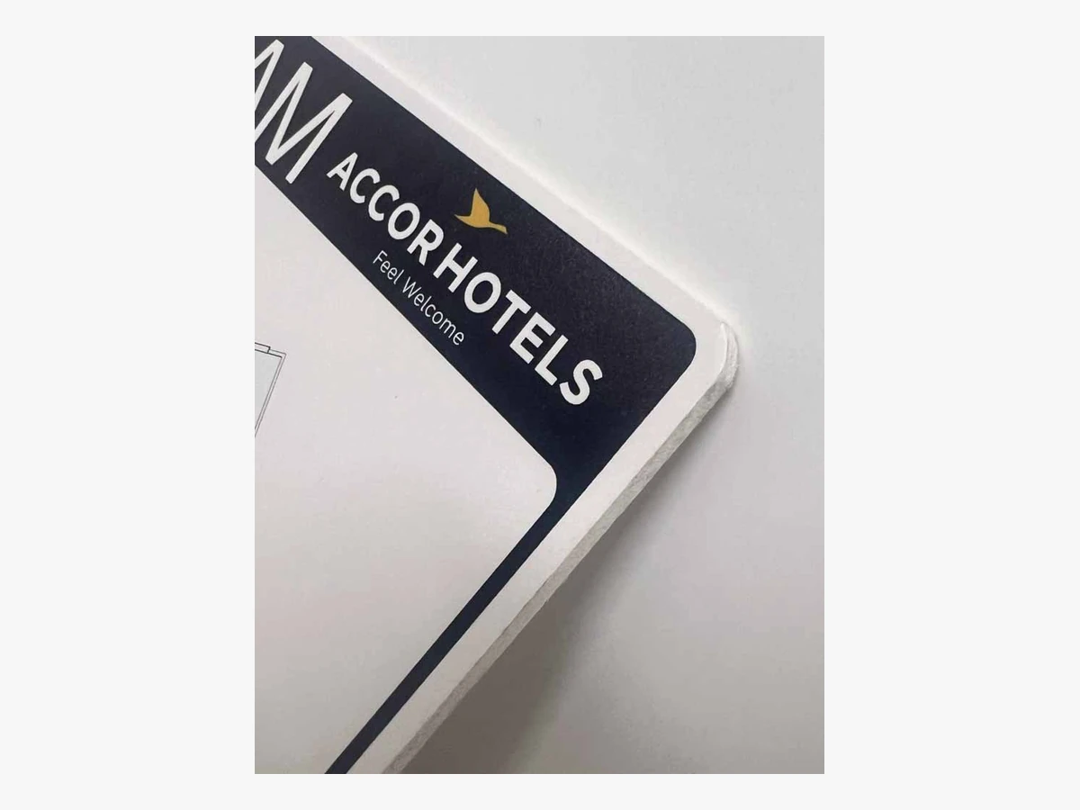 Close-up of a 3 mm foam PVC evacuation sign edge